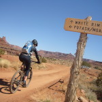 white rim mountain bike canyonlands woman