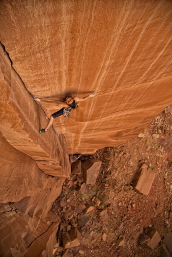 Pro climber Steph Davis climbing "Glad To Be A Trad" rated 5.13 in Southern Utah. Photo: Chris Noble