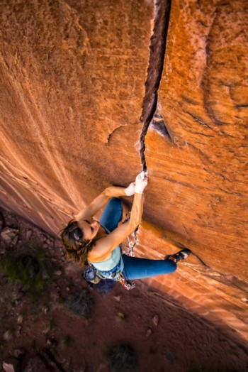 Pro climber Steph Davis climbing "Hidden Gem" rated 5.13, near Moab Utah. Photo: Chris Noble